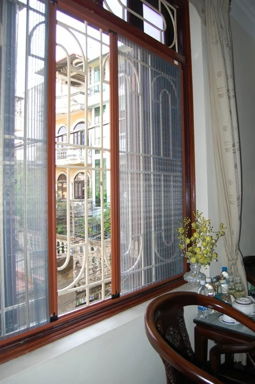 Cửa lưới chống muỗi thông minh xếp có ray 2 cánh